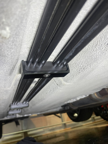 Universal slim billet fuel line brackets.